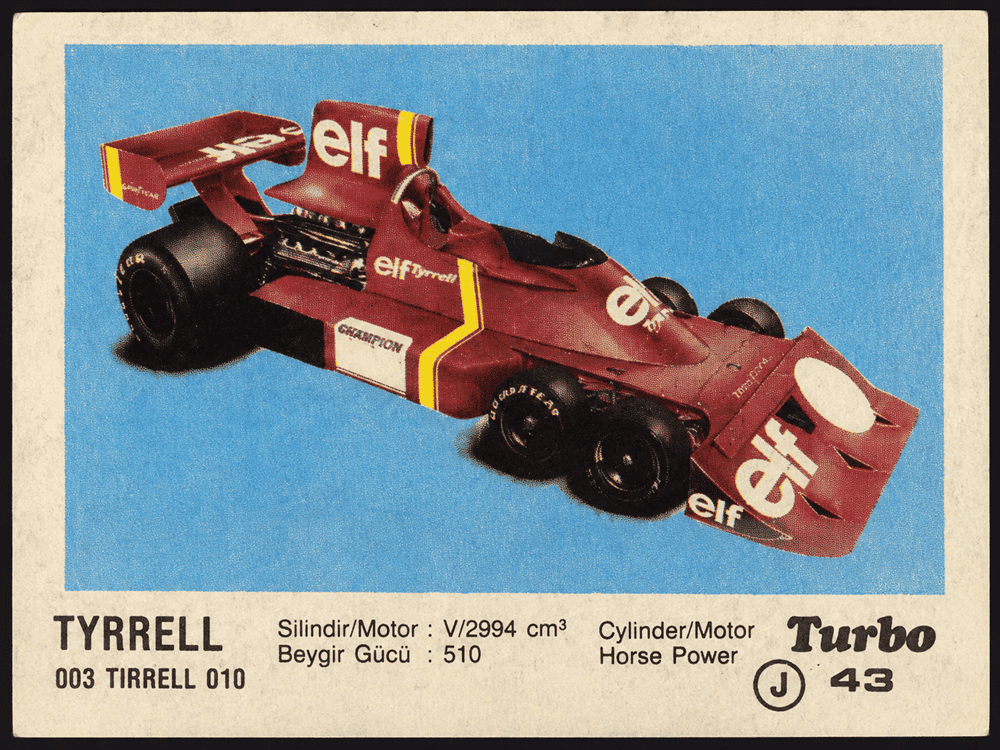 Turbo gum wrapper featuring Tyrrell 010 Formula 1 race car in Elf livery, vintage motorsport collectible insert