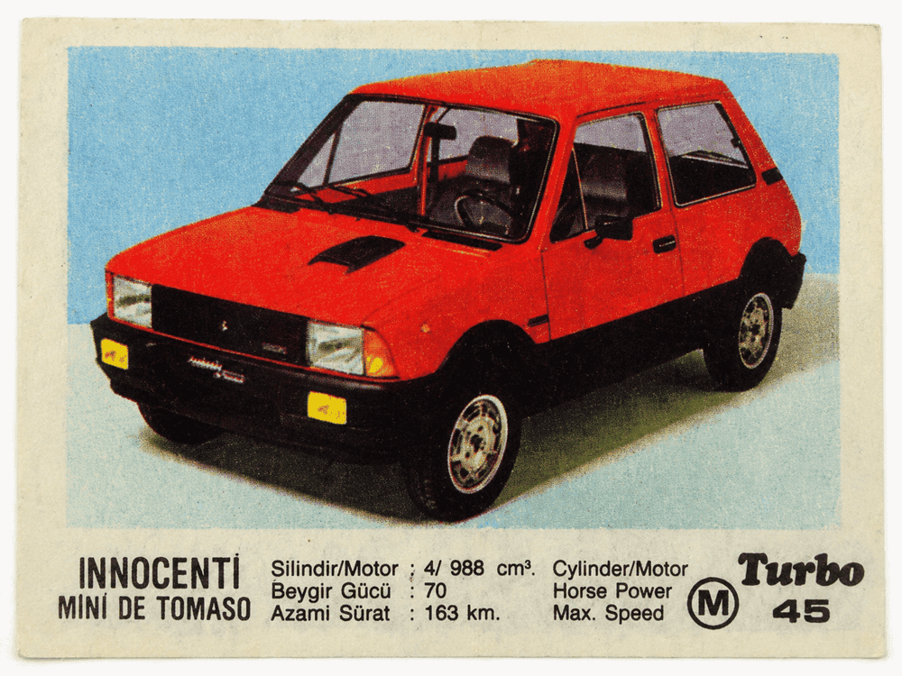 Turbo gum wrapper with red Innocenti Mini De Tomaso, vintage compact car collectible insert