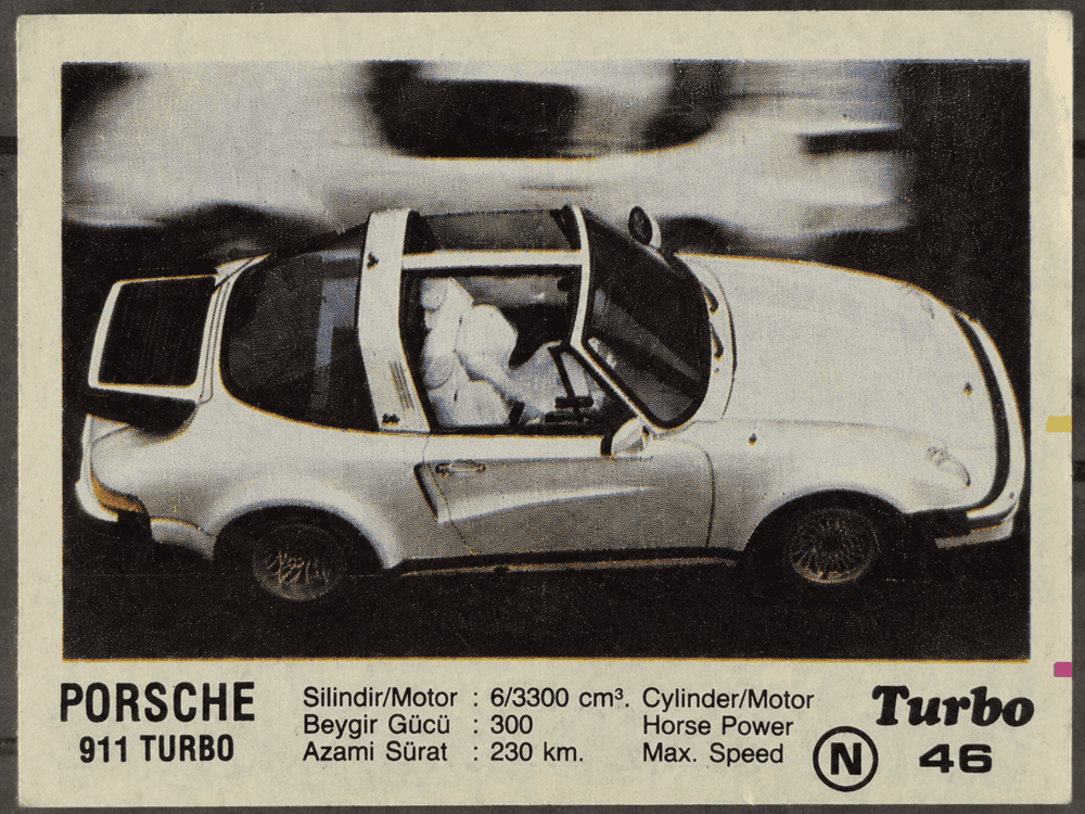 Turbo gum wrapper featuring white Porsche 911 Turbo, vintage sports car collectible insert