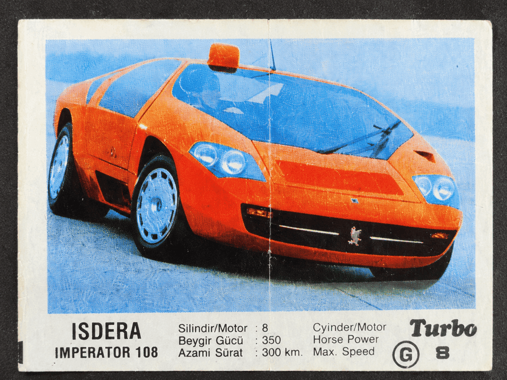 Turbo gum wrapper with orange Isdera Imperator 108 exotic sports car, collectible car insert